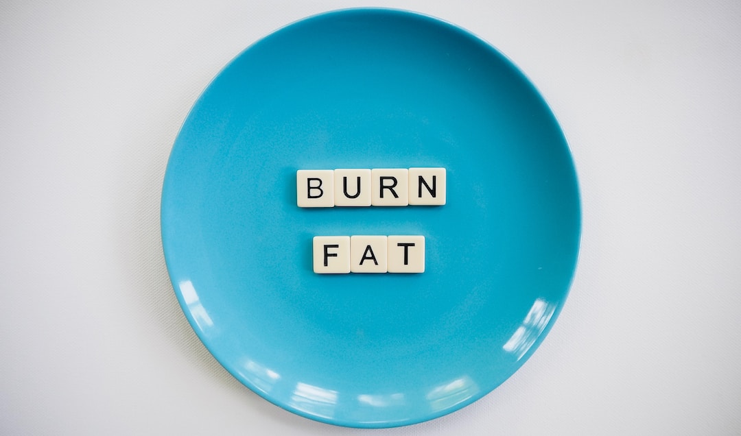 burn fat letter on a blue plate
